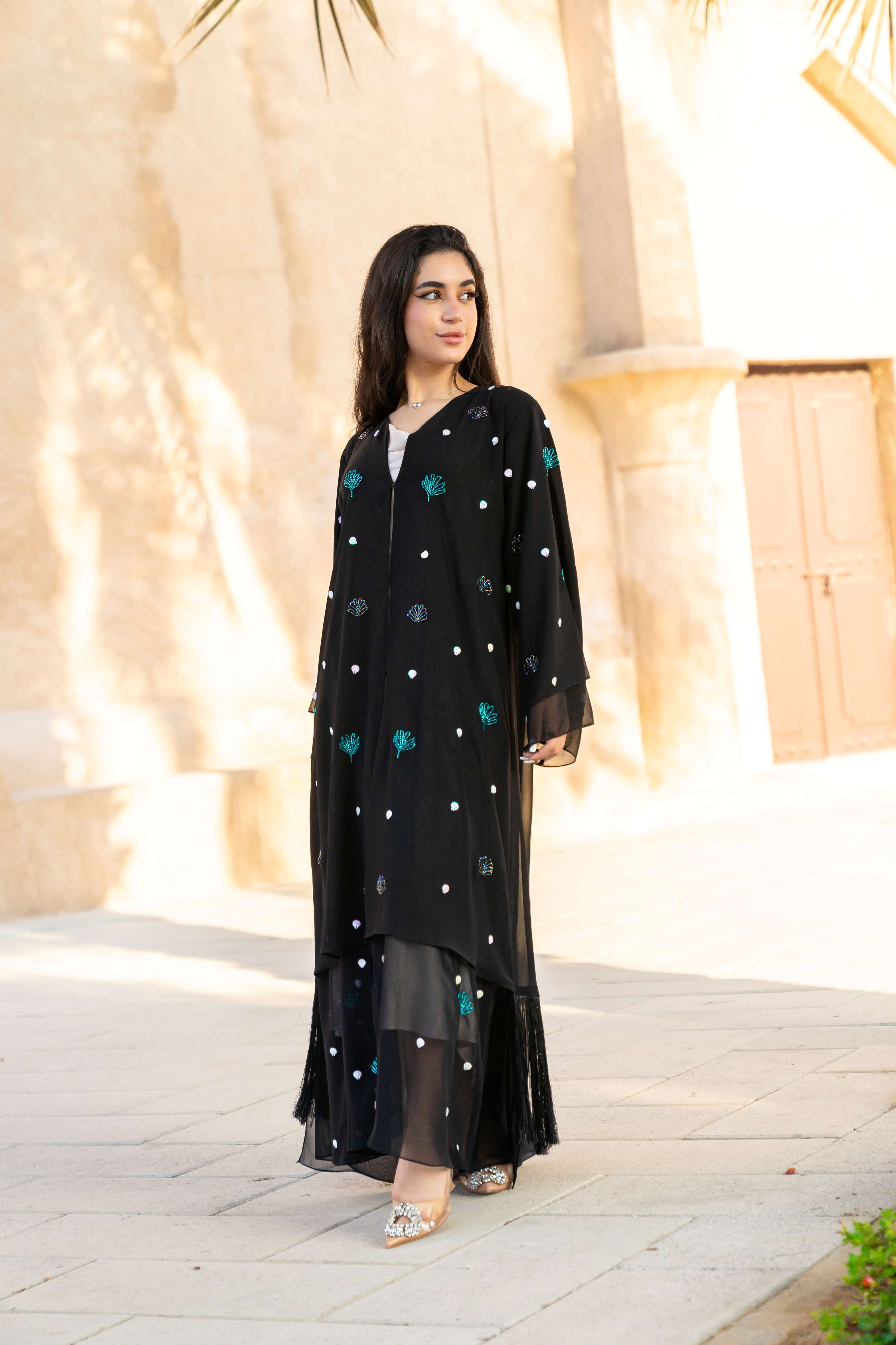 Abaya with shell embellishments and tassel detailing