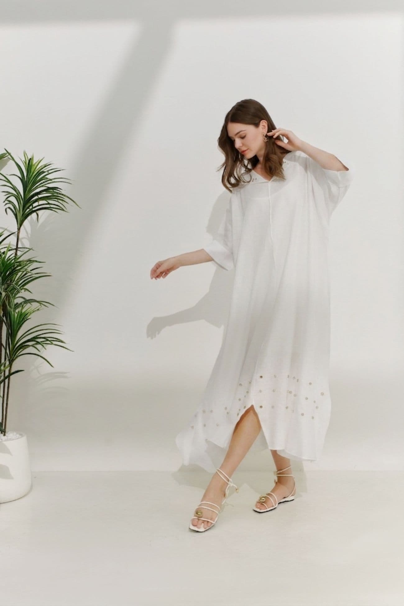 Loose white linen dress